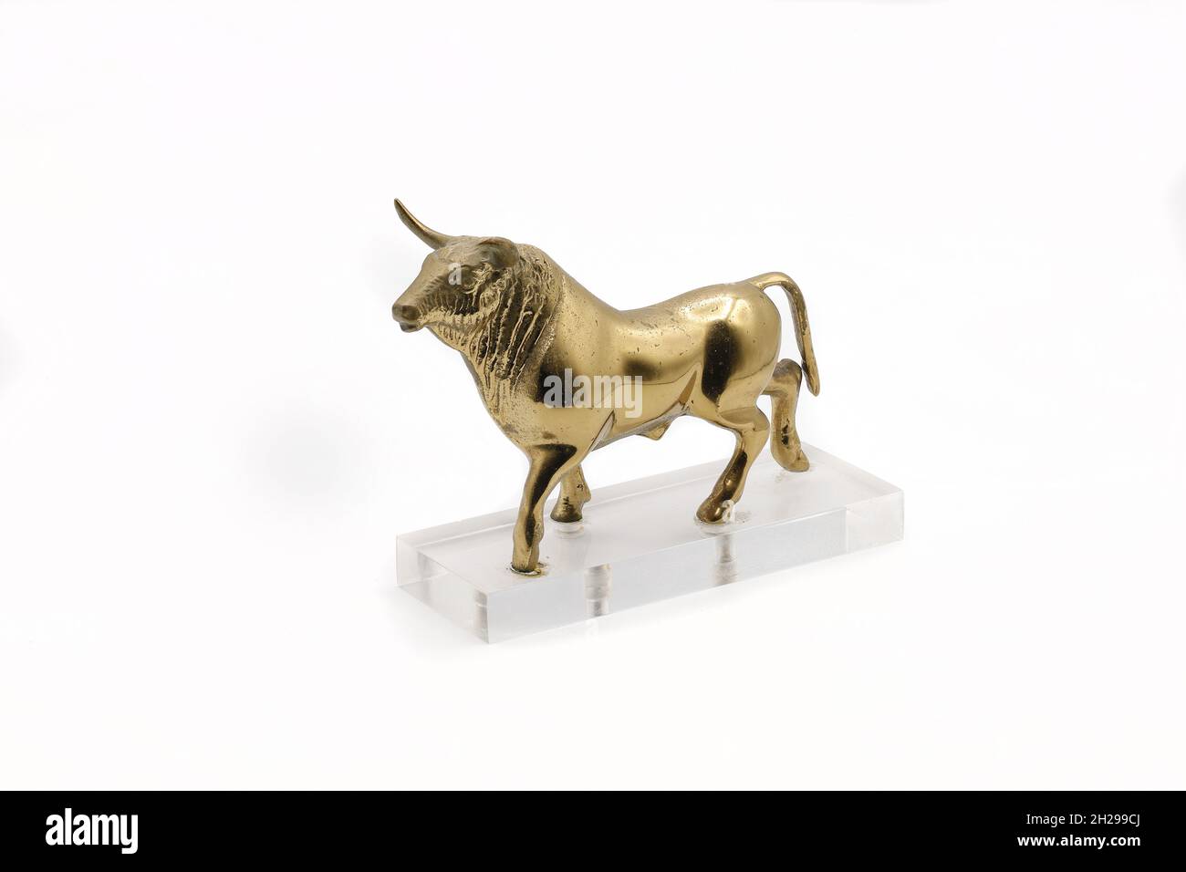 Beautiful antique bronze bull on white background Stock Photo