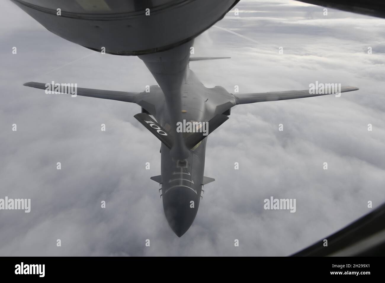 A 9th Expeditionary Bomb Squadron B-1B Lancer, deployed in support of Bomber Task Force Europe 22-1, receives fuel from a 100th Air Refueling Wing KC-135 Stratotanker enroute to a Black Sea maritime targeting training mission, Oct. 19, 2021. The Bomber Task Force Europe mission series requires a joint and coalition force to support strategic bomber deployments within the European theater, which amplifies readiness and promotes interoperability between rotational bomber aircrew, NATO allies, and coalition partners. Stock Photo