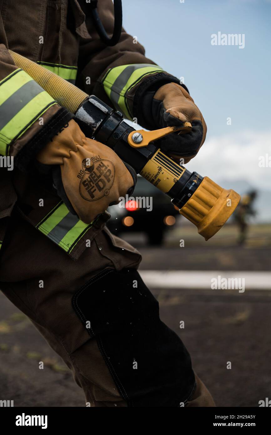 Usmc Firefighting U.S. Marine Corps Cpl. Manuel Fernandez, a Chicago native, with Airport ...