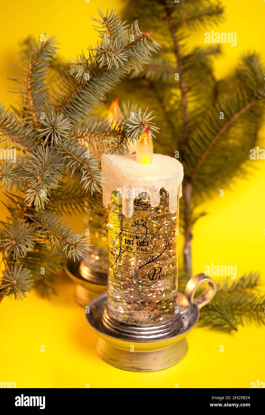 christmas glowing candle in new year background Stock Photo Alamy