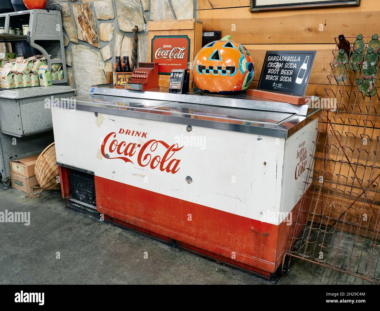 Vintage or antique 1950's or 1960's Coca Cola or Coke machine, chest type on display in Ellijay Georgia, USA. Stock Photo