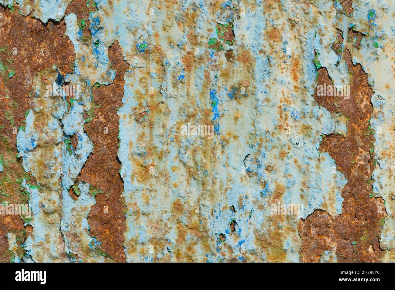iron doors in the foreground rusty and useless Stock Photo