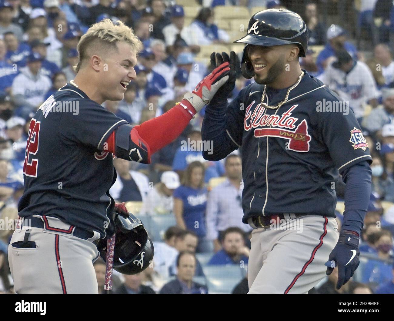 Los Angeles, United States. 20th Oct, 2021. Atlanta Braves left fielder Eddie Rosario (R) celebrates with teammate Joc Pederson after hitting a solo home run against the Los Angeles Dodgers during the second inning in game four of the MLB NLCS at Dodger Stadium on Wednesday, October 20, 2021 in Los Angeles, California. Atlanta leads Los Angeles 2-1 in the championship series. Photo by Jim Ruymen/UPI Credit: UPI/Alamy Live News Stock Photo