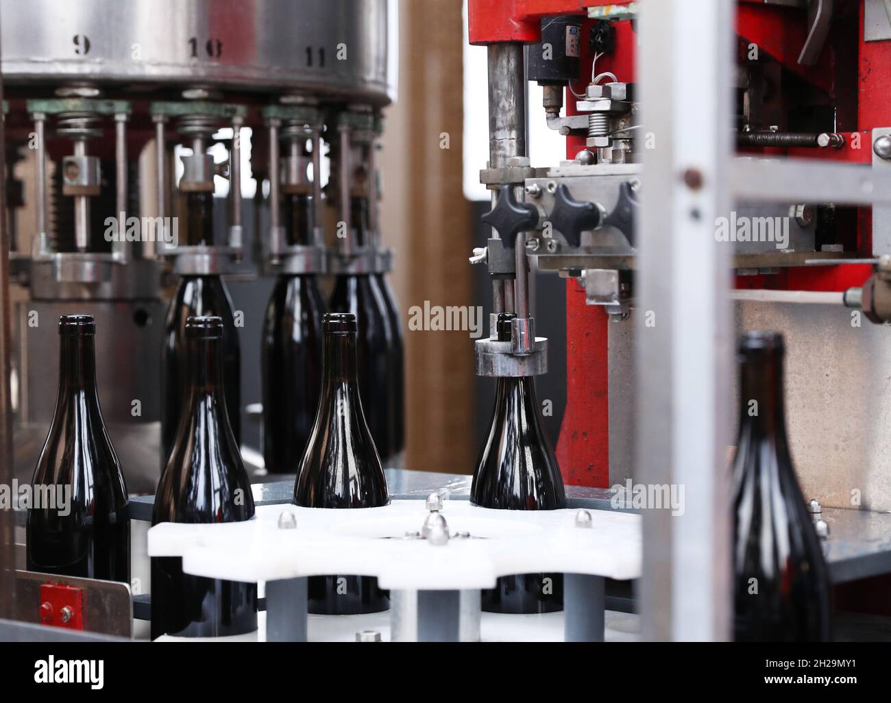 Paris, France. 20th Oct, 2021. Photo taken on Oct. 20, 2021 shows the product line of wine bottling at the first floor of the Eiffel Tower in Paris, France. The second batch of 'Chai de la tour Eiffel' wine was released here on Wednesday. Credit: Gao Jing/Xinhua/Alamy Live News Stock Photo