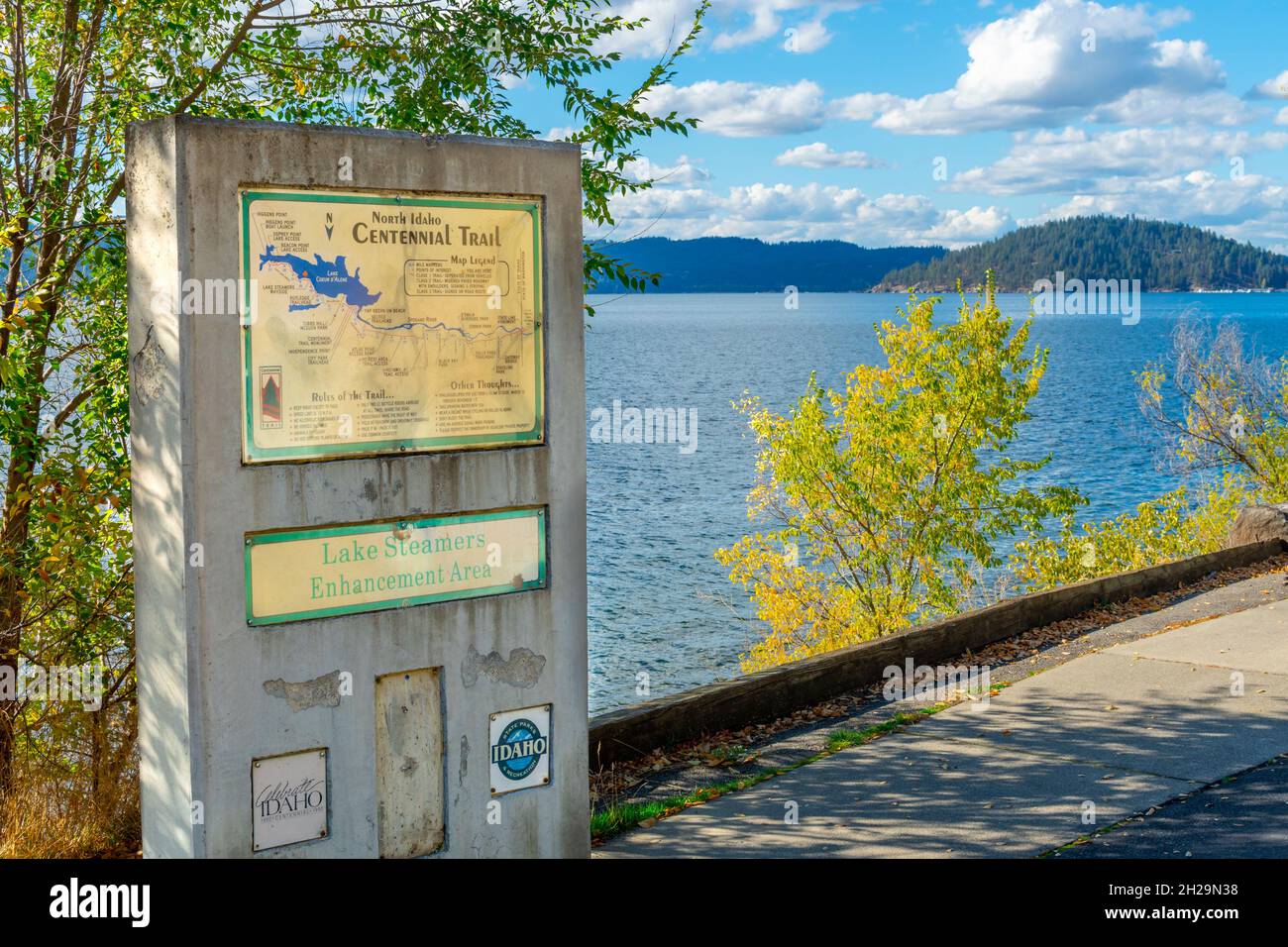 A sign for the Centennial Trail along Lake Coeur d'Alene near Higgins Point in Coeur d'Alene, Idaho, USA. Stock Photo