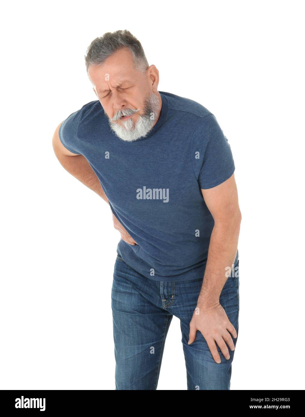 Man suffering from flank pain on white background Stock Photo - Alamy