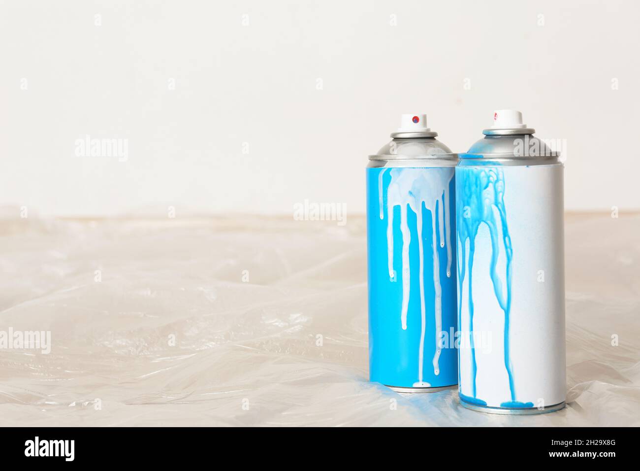 Used cans of spray paint indoors. Space for text Stock Photo Alamy