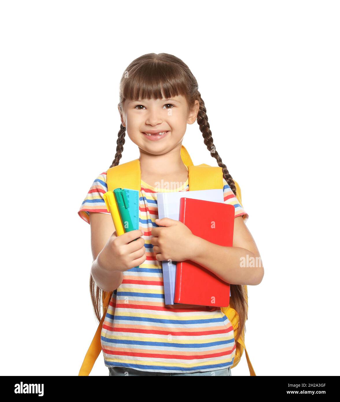 Cute girl with school stationery on white background Stock Photo - Alamy