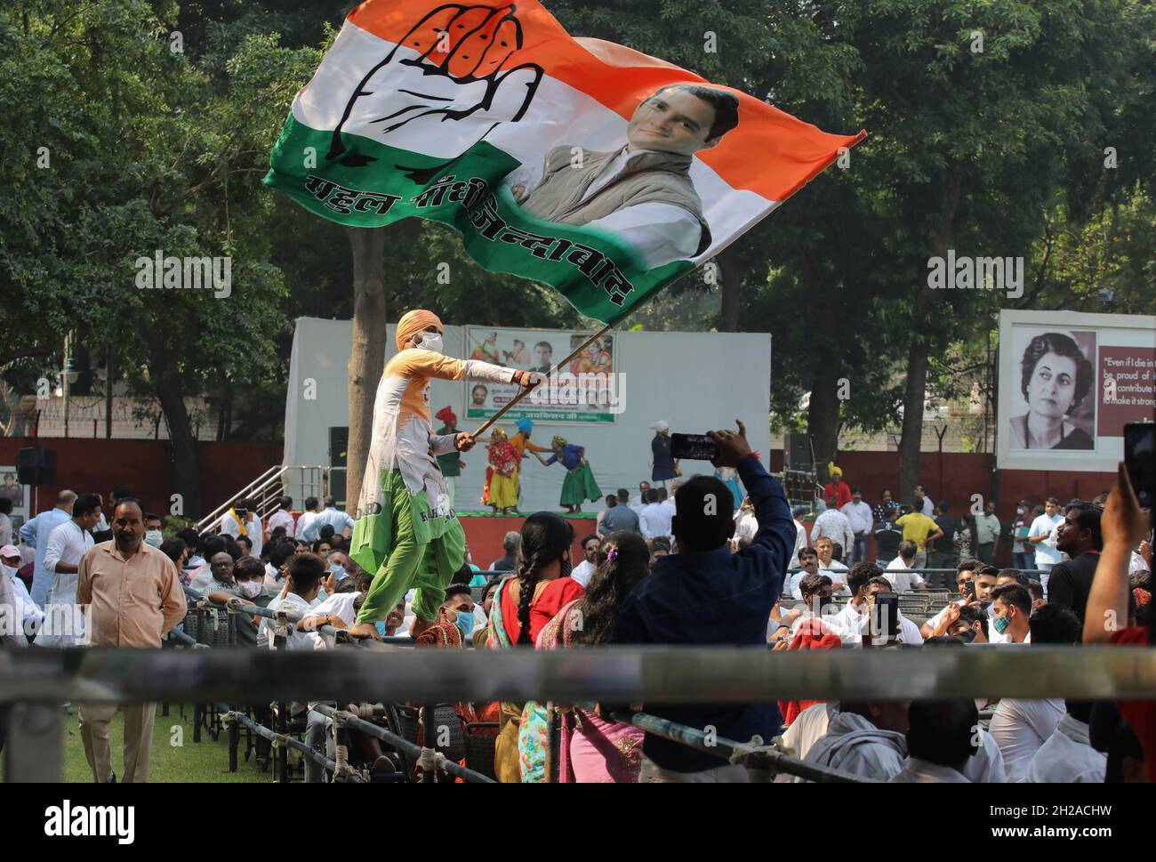New Delhi, India. 20th Oct, 2021. A supporter unfurled the Congress leader Rahul Gandhi during the flag-off ceremony of Shobha Yatra on the occasion of Maharishi Valmiki Jayanti, at All India Congress Committee headquarter. Valmiki Jayanti, is an annual Indian festival celebrated in particular by the Balmiki religious group, to commemorate the birth of the ancient Indian poet and philosopher Valmiki. Credit: SOPA Images Limited/Alamy Live News Stock Photo