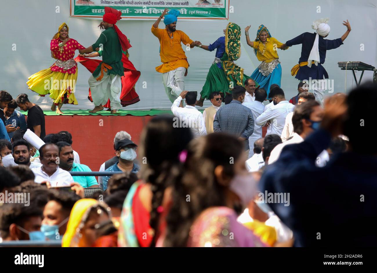 New Delhi, India. 20th Oct, 2021. Folk artists perform while supporters celebrate during the flag-off ceremony of Shobha Yatra on the occasion of Maharishi Valmiki Jayanti, at All India Congress Committee headquarter. Valmiki Jayanti, is an annual Indian festival celebrated in particular by the Balmiki religious group, to commemorate the birth of the ancient Indian poet and philosopher Valmiki. (Photo by Naveen Sharma/SOPA Images/Sipa USA) Credit: Sipa USA/Alamy Live News Stock Photo