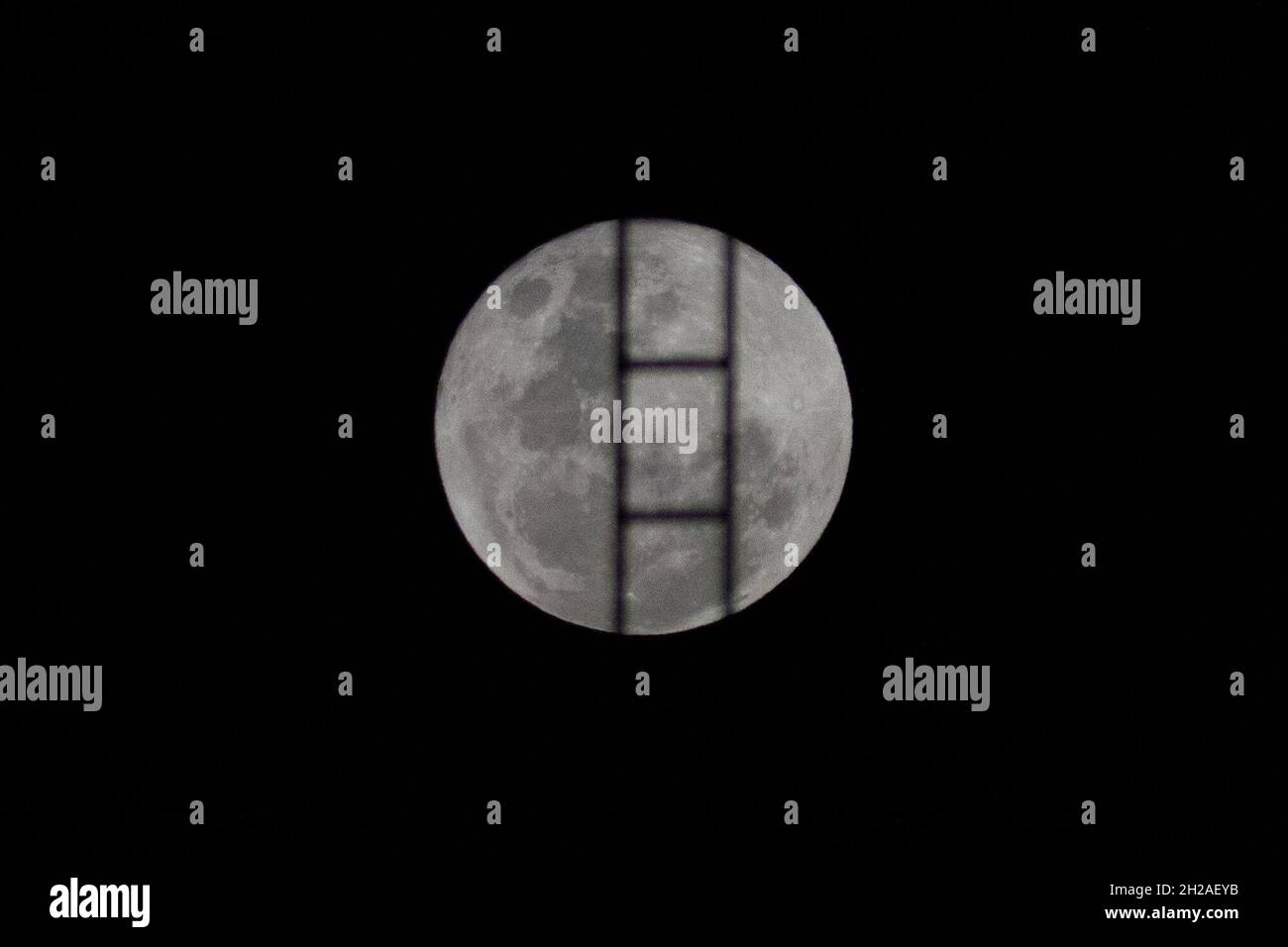 Santiago, Metropolitana, Chile. 20th Oct, 2021. The October full moon, called the Hunter's Moon, behind an emergency staircase, in Santiago, Chile. (Credit Image: © Matias Basualdo/ZUMA Press Wire) Stock Photo