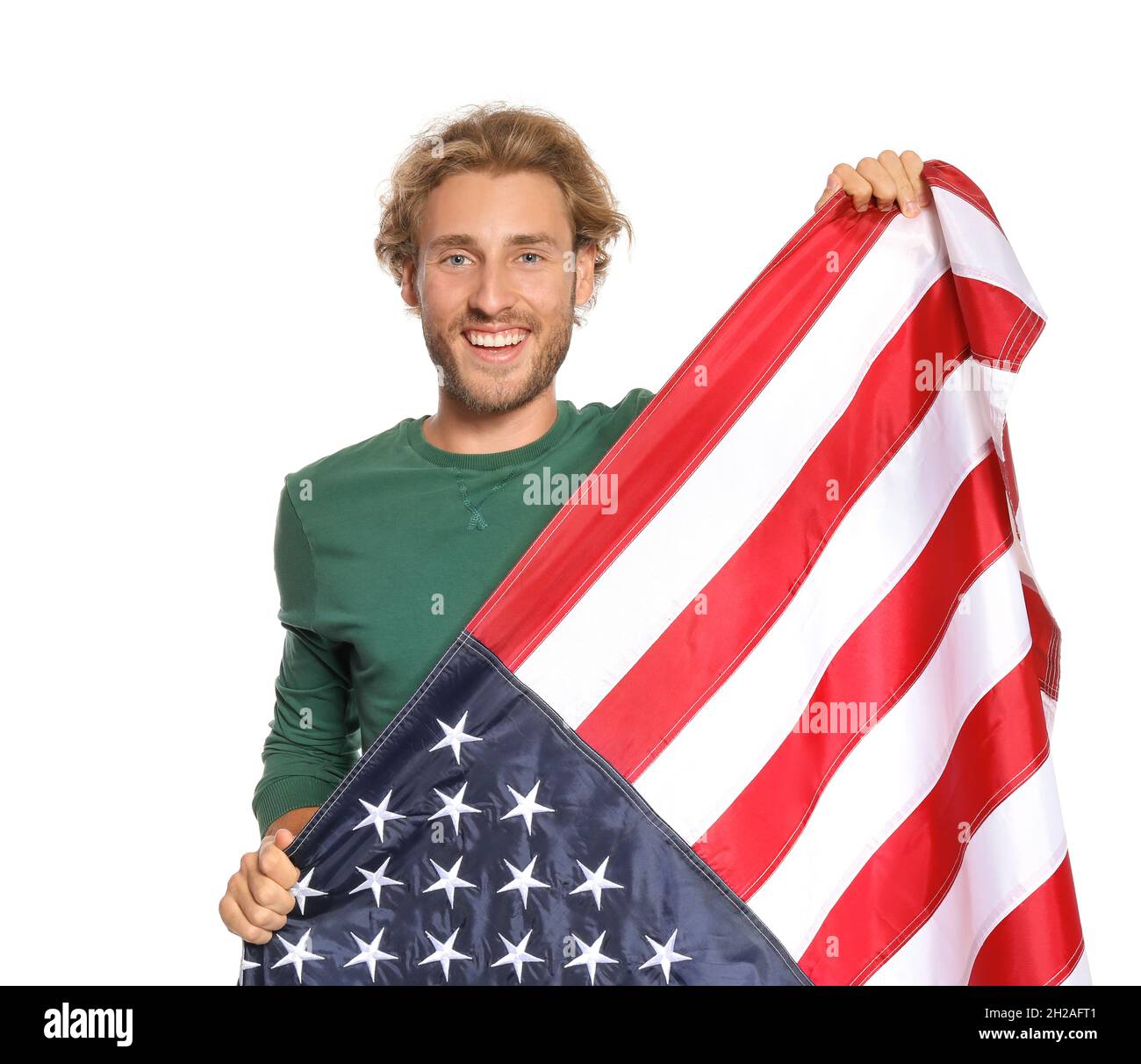 Young man with American flag on white background Stock Photo - Alamy