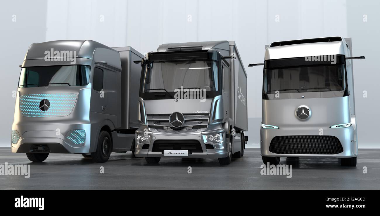 Electric trucks in a studio representing Mercedes-Benz electromobility Stock Photo