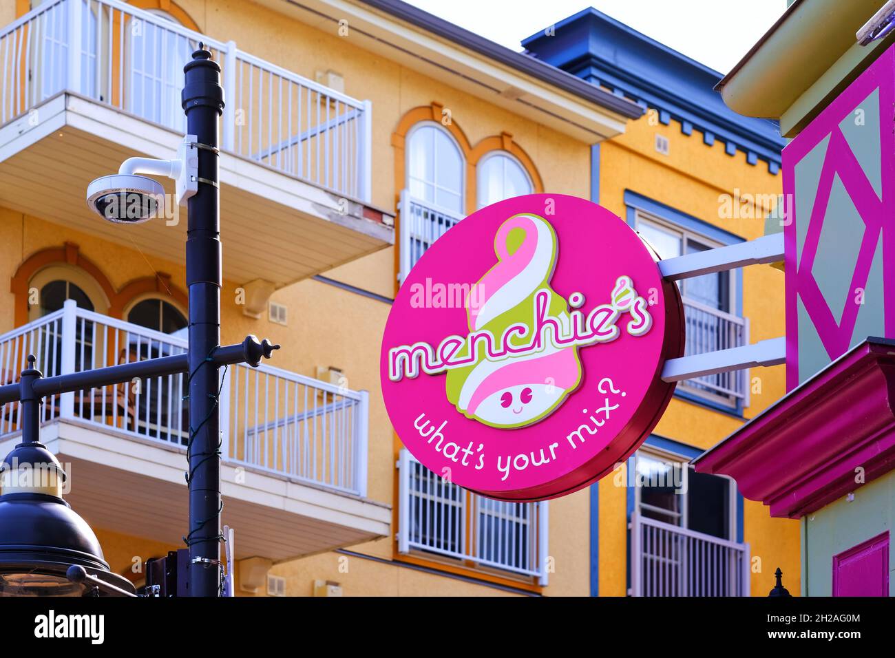 Frozen yogurt shop Menchie's store sign at Blue Mountain Village