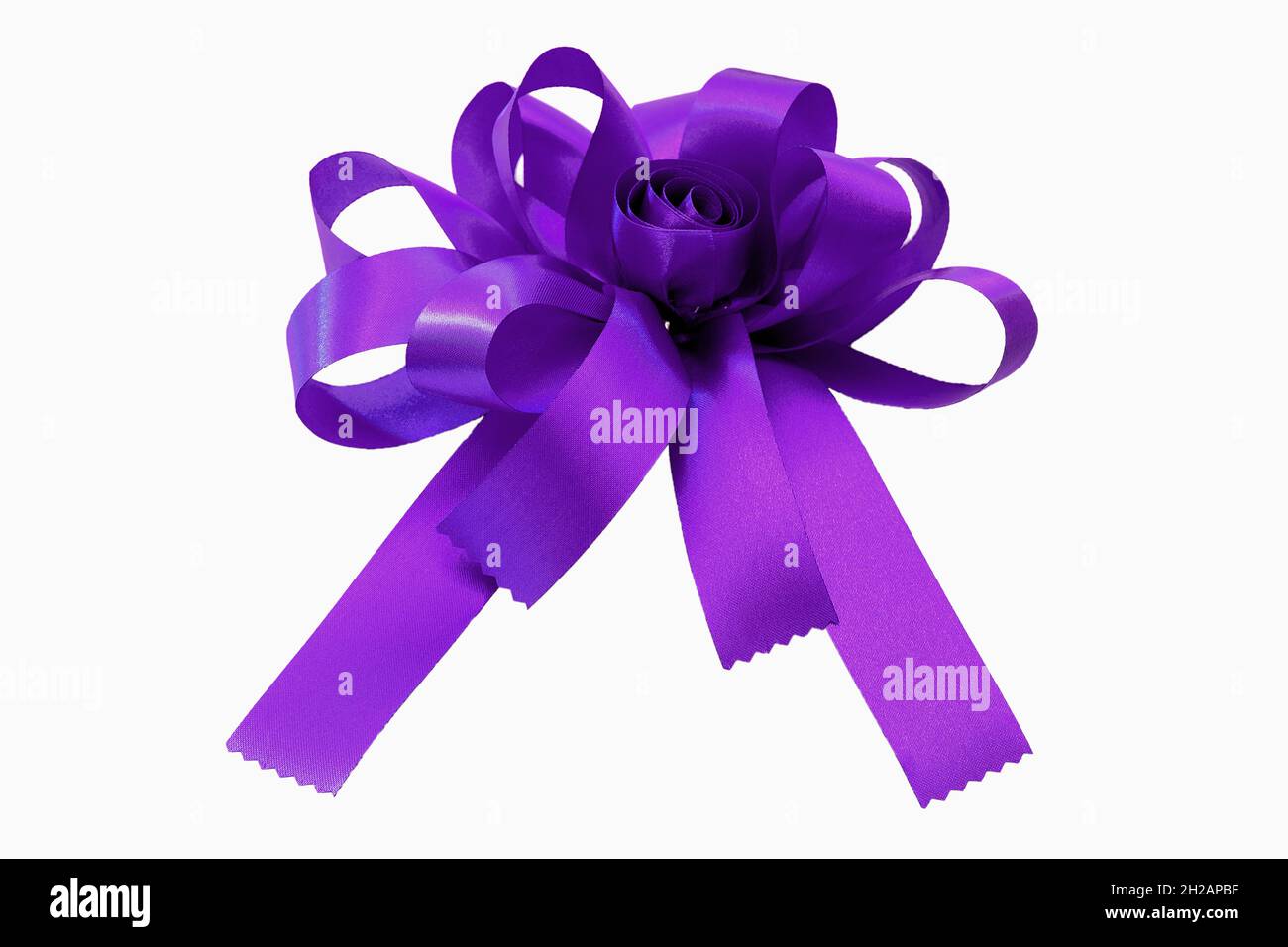 Green ribbon bow isolated on white background Stock Photo - Alamy