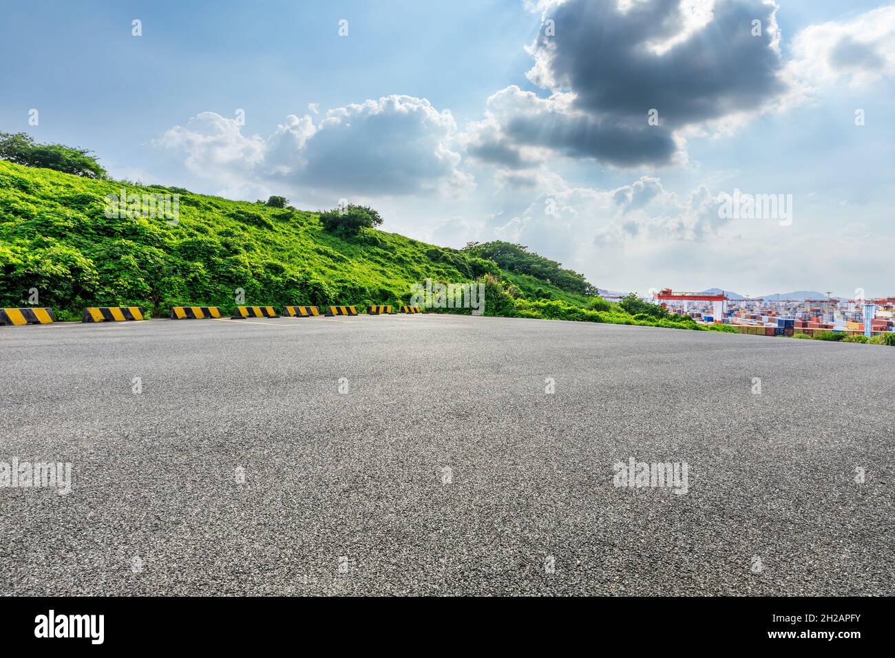 Asphalt road and green mountain nature landscape. Stock Photo