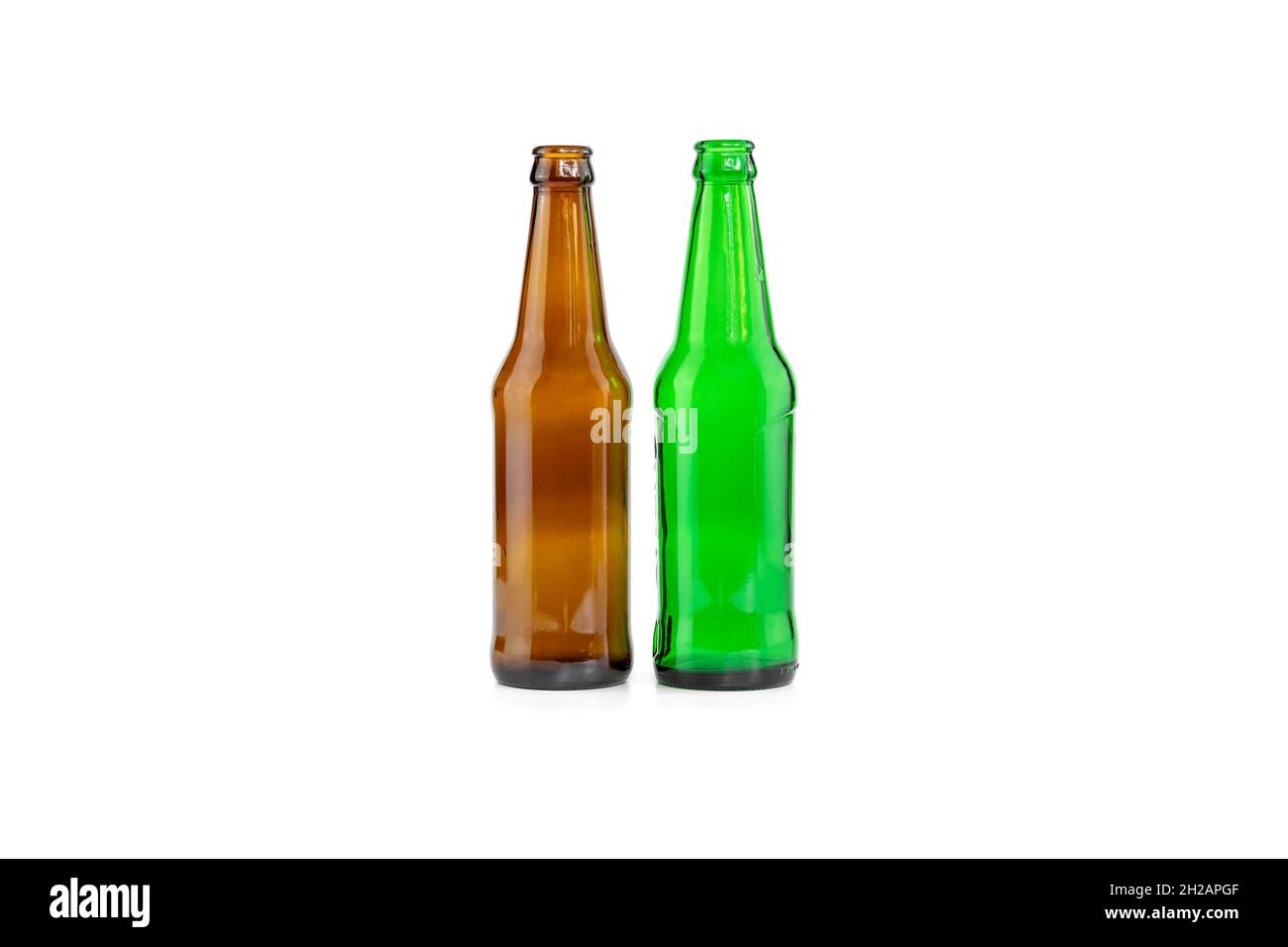 Empty brown and green beers bottles isolated on white background Stock