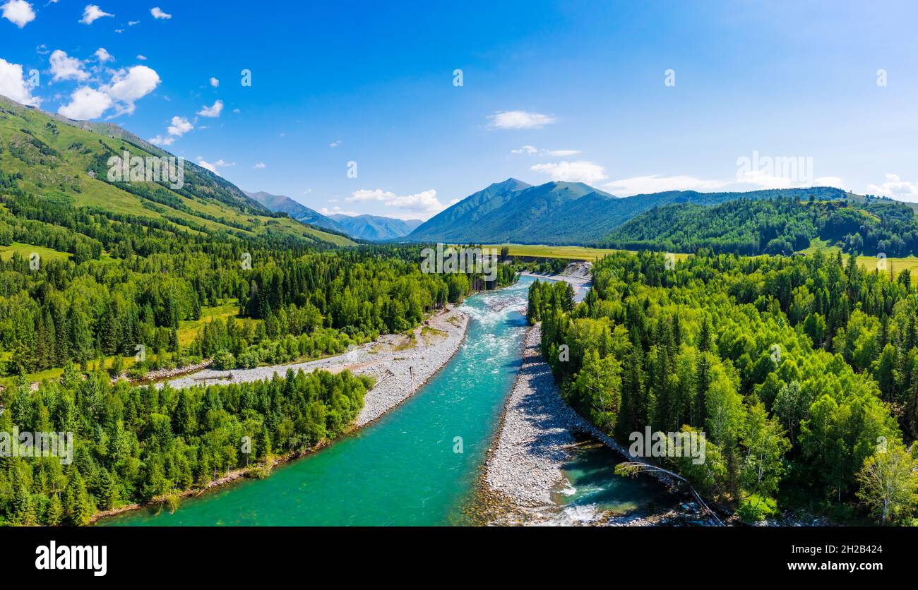 Mountain and forest with river natural scenery in Hemu Village,Xinjiang,China. Stock Photo