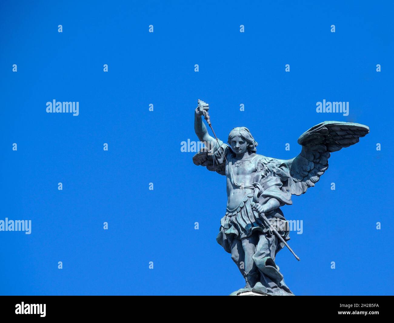 Photo take on the Sant'Angelo bridge, sculpture of Archangel Michael. Stock Photo