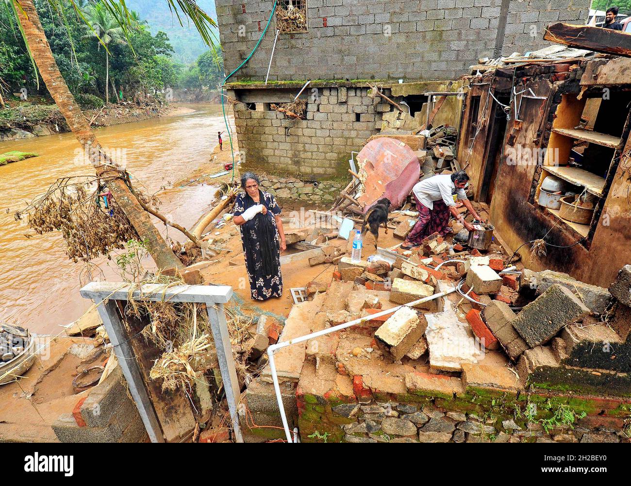 Kerala. 20th Oct, 2021. Photo taken on Oct. 20, 2021 shows damaged ...