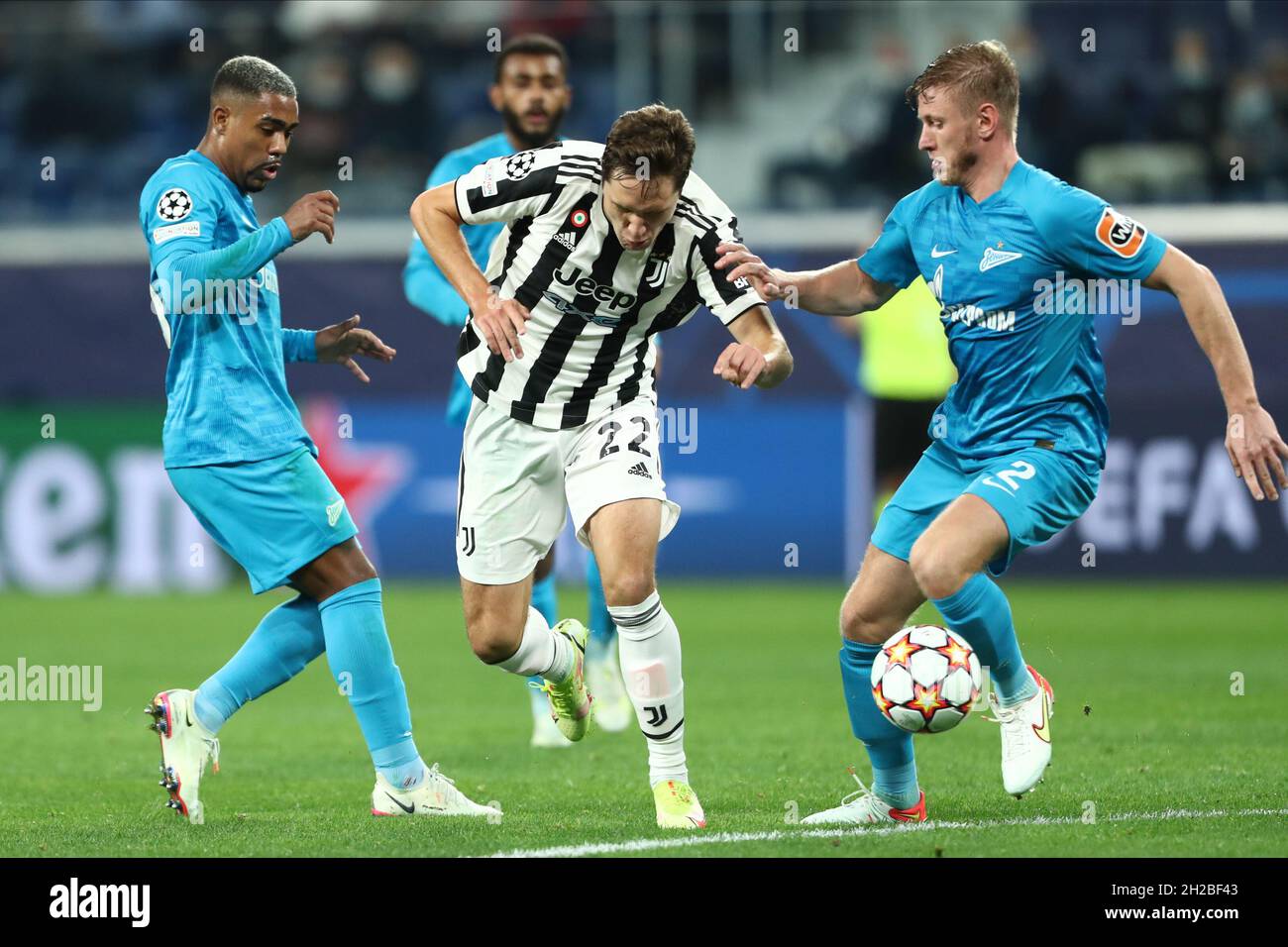 forward Malcom of FC Zeni, midfielder Federico Chiesa of FC Juventus and defnder Dmitri Chistyakov of FC Zenit during UEFA Champions League match FC Zenit v FC Juventus at Gazprom Arena in Saint Petersburg. SAINT PETERSBURG,  - OCTOBER 20: (Photo by Anatoliy Medved) Stock Photo