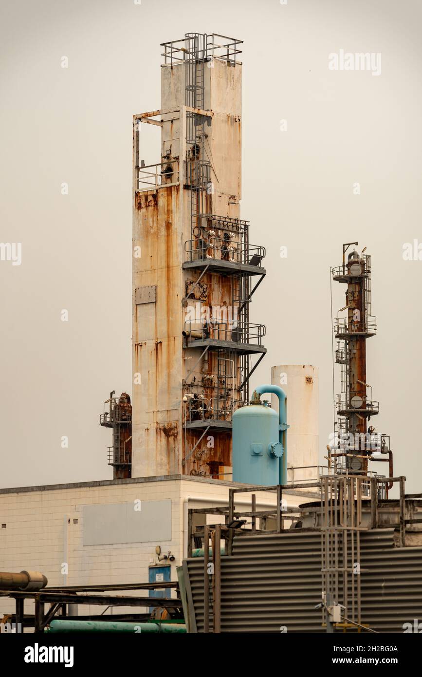 industrial plant old rusted tower for cooling Stock Photo