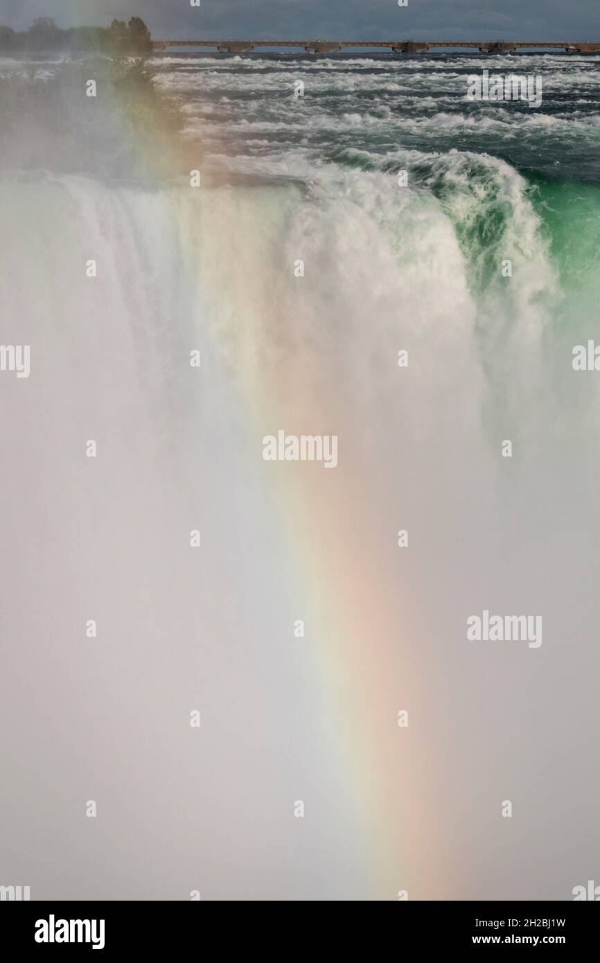 Rainbow at Niagara Falls, Canada. Vertical Format. Stock Photo