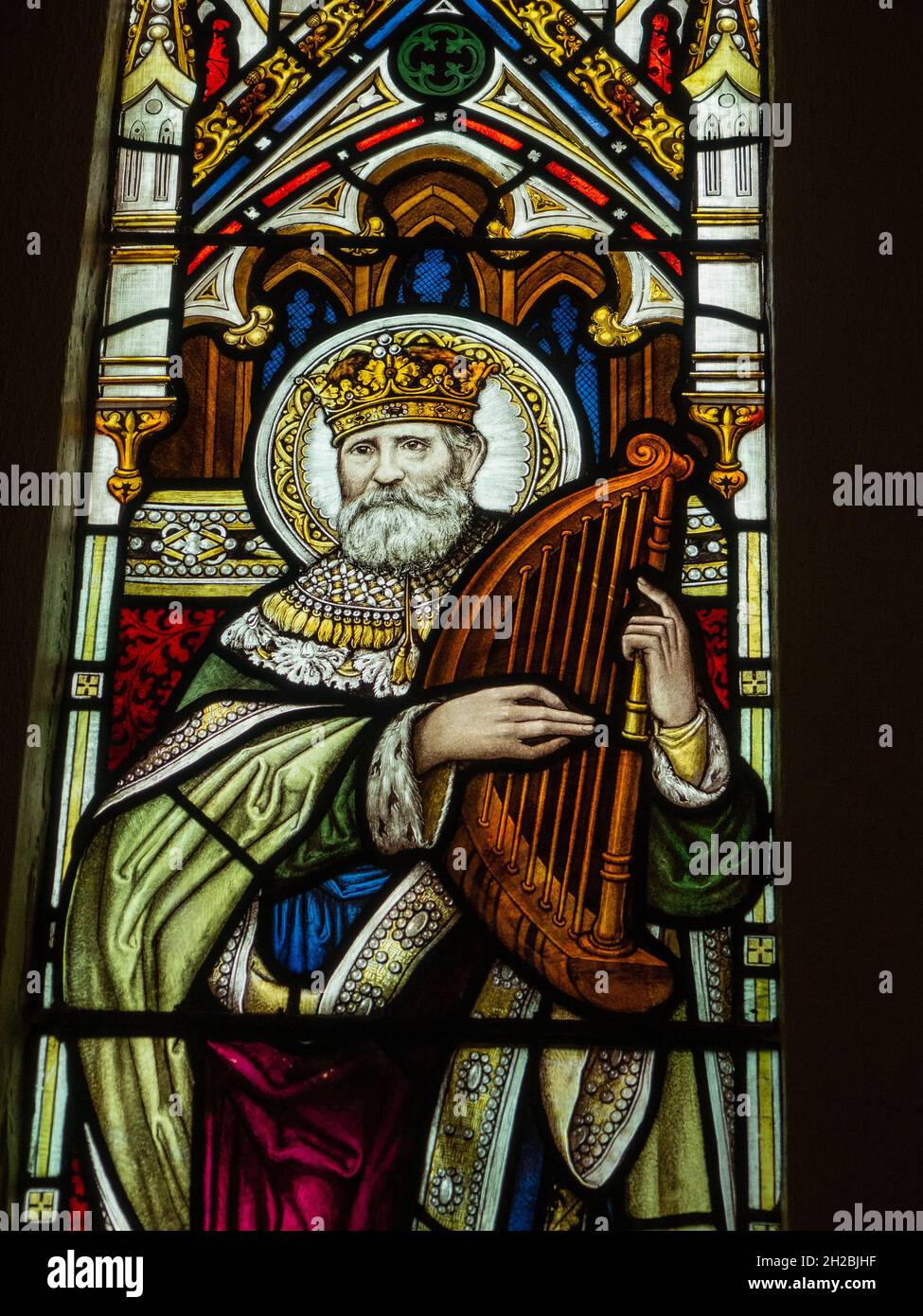 Detail from a Victorian stained glass window in the church of St Lawrence, Eyam, Derbyshire, UK Stock Photo
