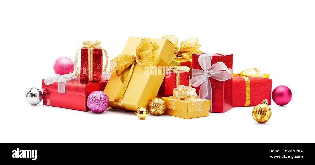 Pile of christmas gifts and baubles isolated on white background Stock Photo