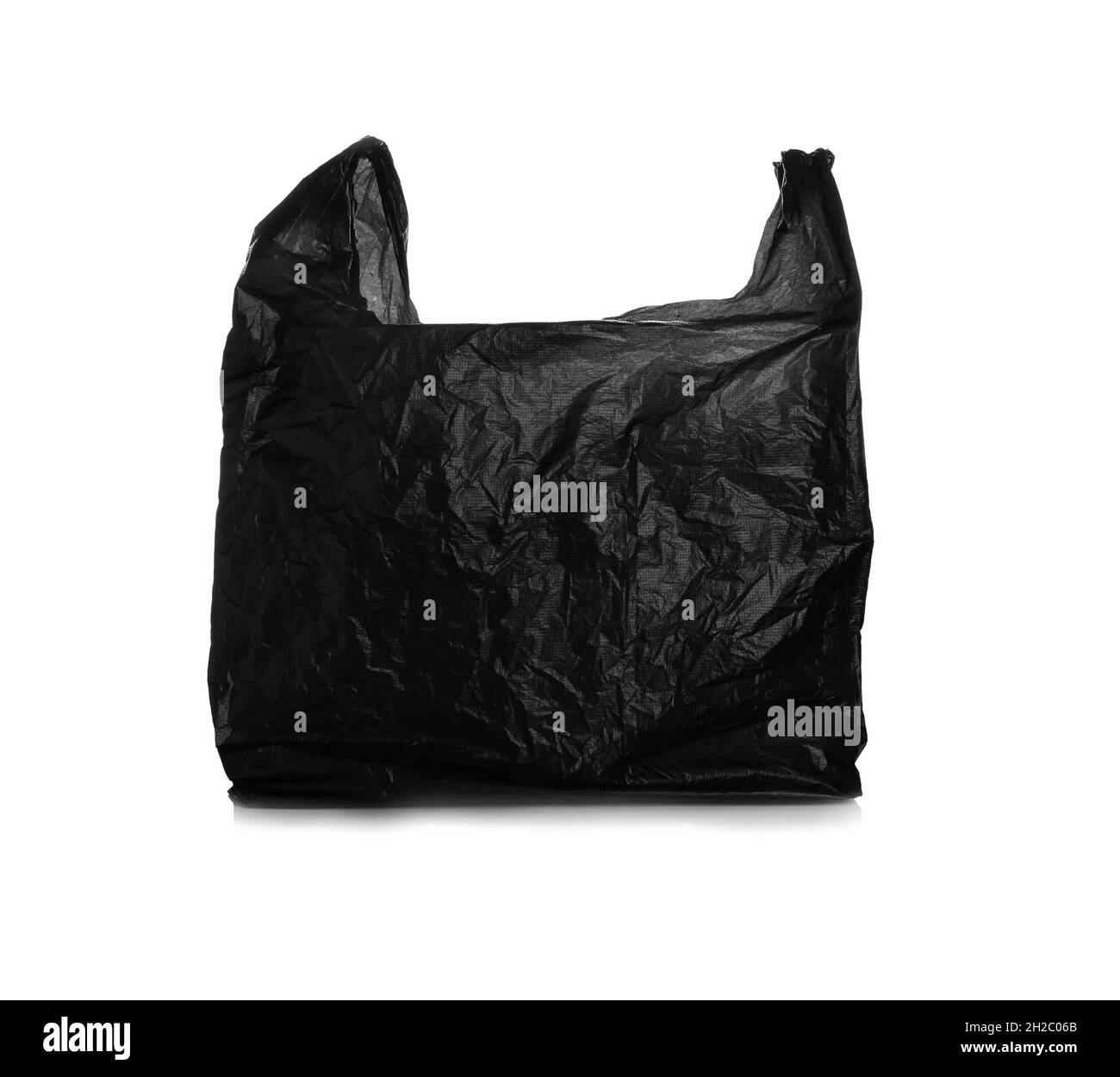 Black disposable plastic bag on white background Stock Photo Alamy