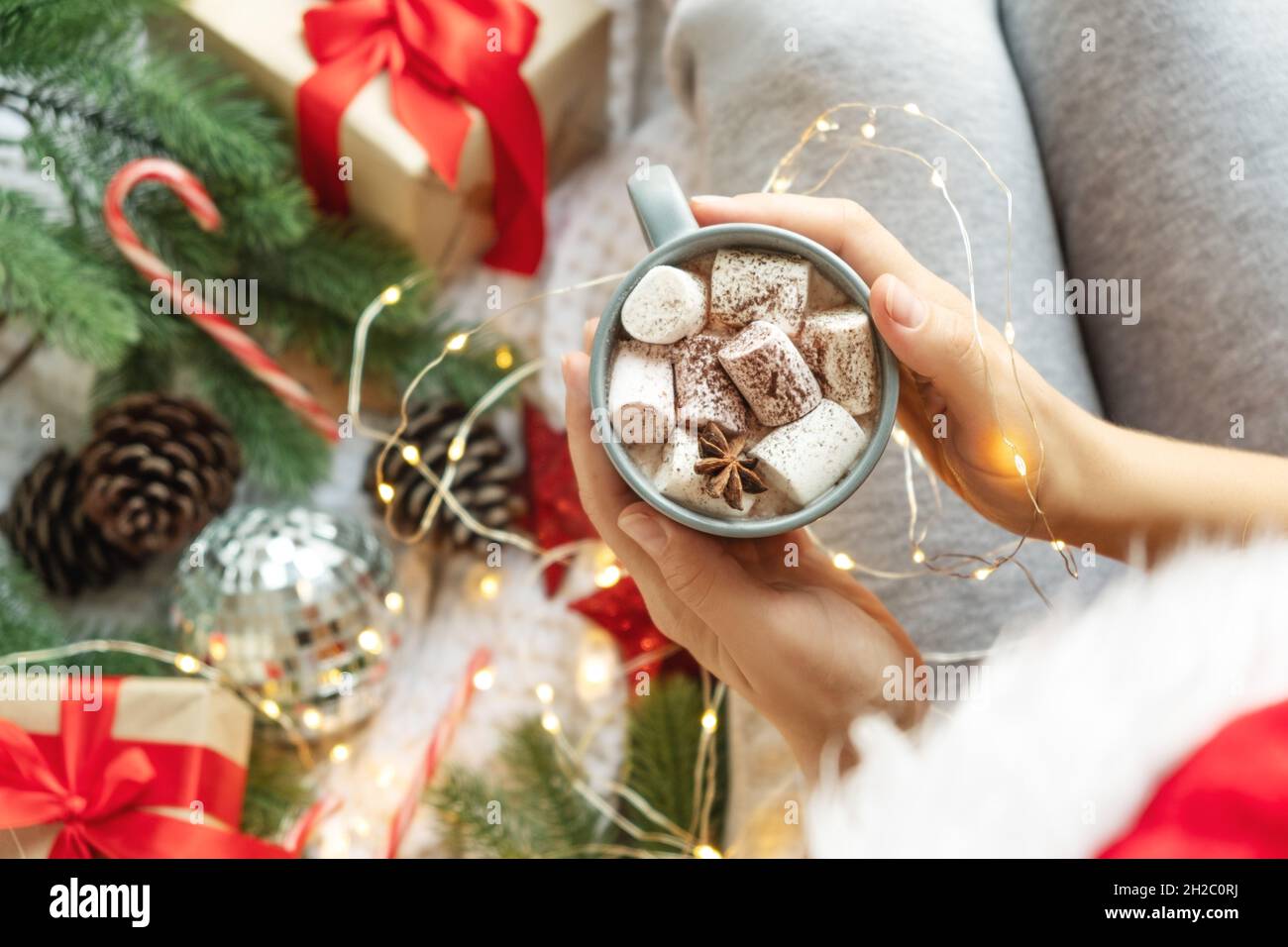 Christmas 2022 Coffee New Year Or Christmas 2022 Top View. Hot Cacao Coffee Or Chocolate With  Marshmallows Mug In Women Hands Xmas Holiday Celebration In Bed With  Garland Lights Stock Photo - Alamy