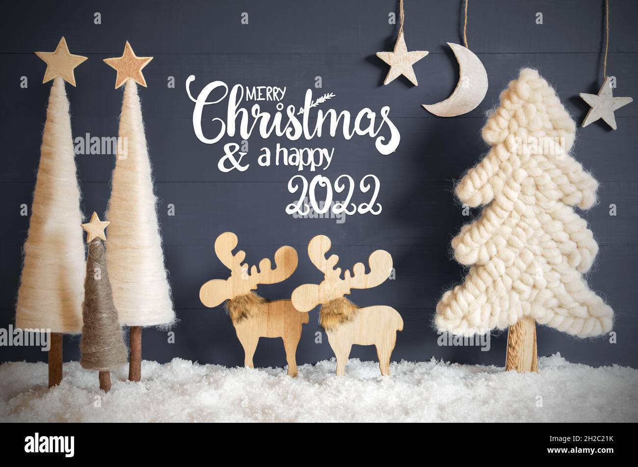 Christmas 2022 Snow Christmas Tree, Moose, Moon, Stars, Snow, Text Merry Christmas And Happy  2022 Stock Photo - Alamy