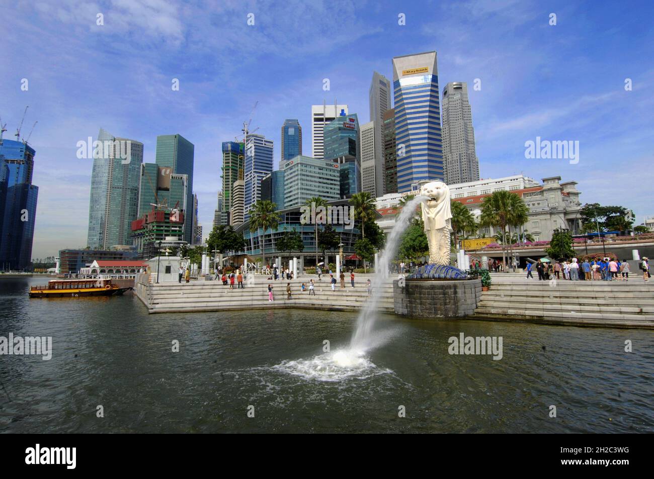 water-spouting Merlion viewed from Marina Bay, official mascot of Singapore , Singapore Stock Photo
