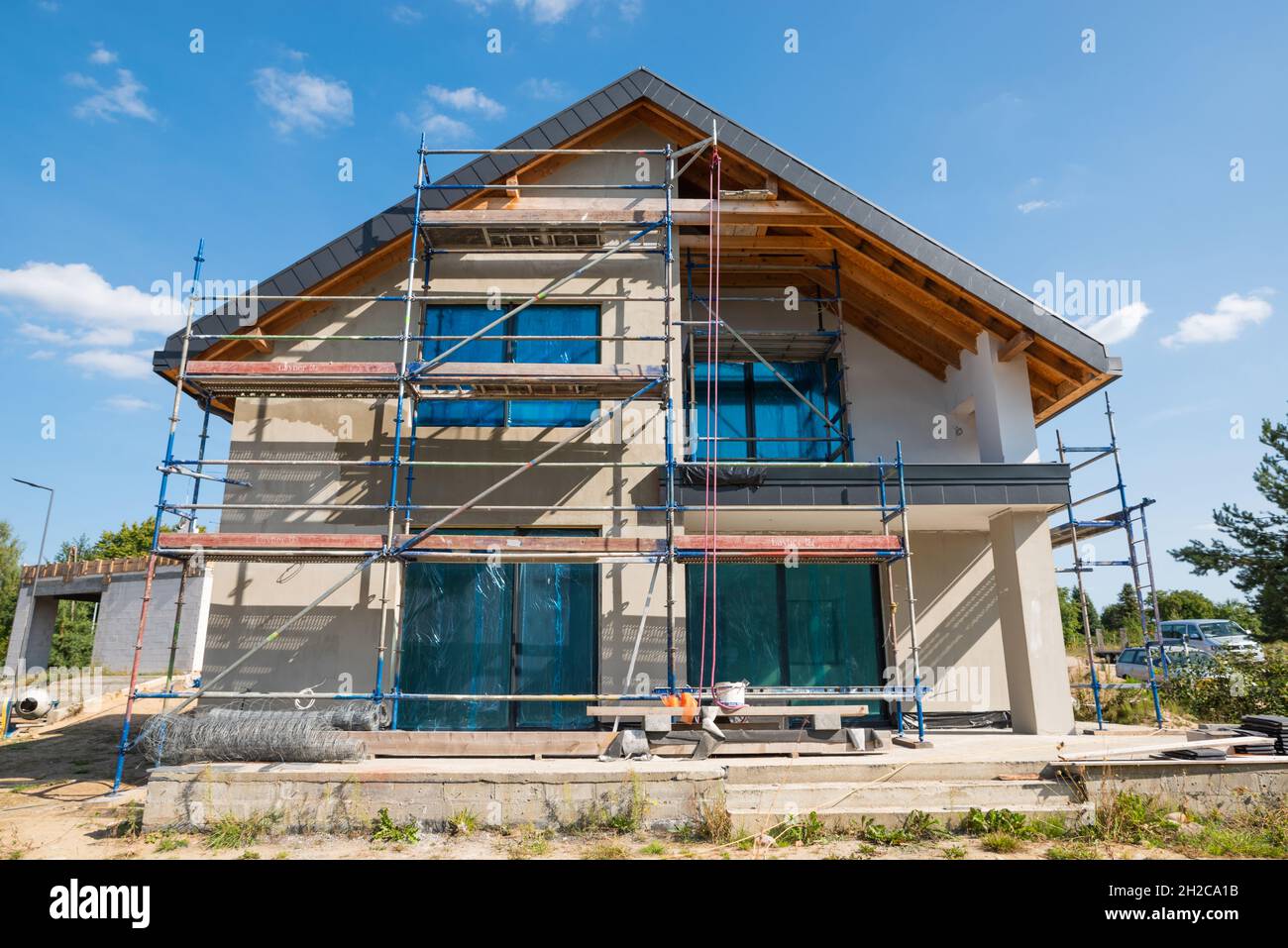 facade with thermal insulation of a single-family house Stock Photo - Alamy