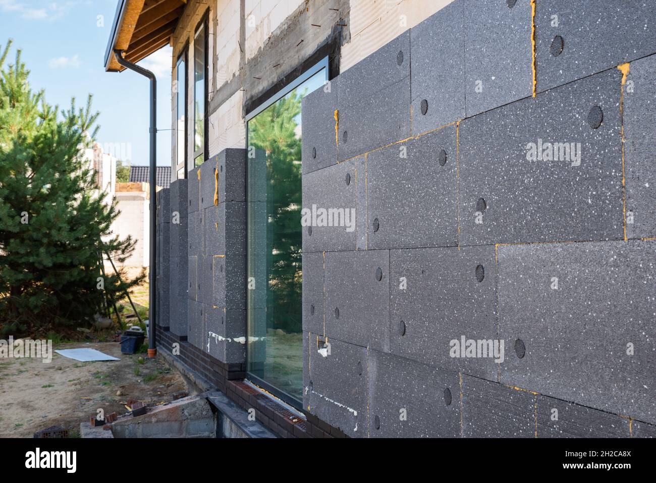 facade with thermal insulation of a single-family house Stock Photo - Alamy