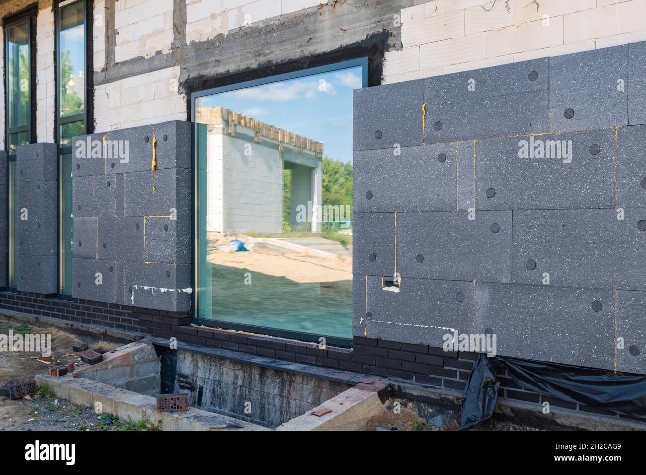 facade with thermal insulation of a single-family house Stock Photo - Alamy