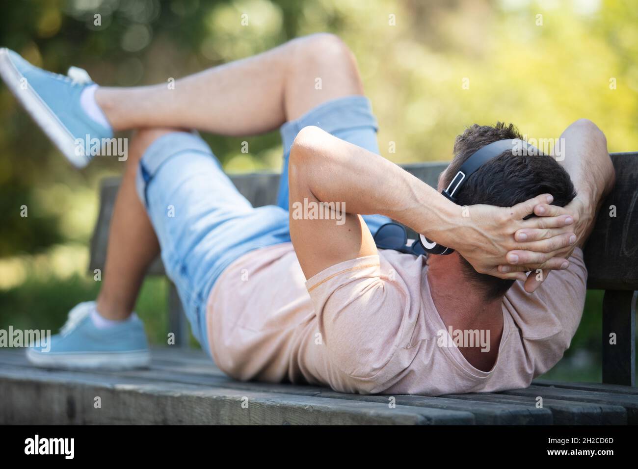 Man sits lake on bench hi-res stock photography and images - Alamy