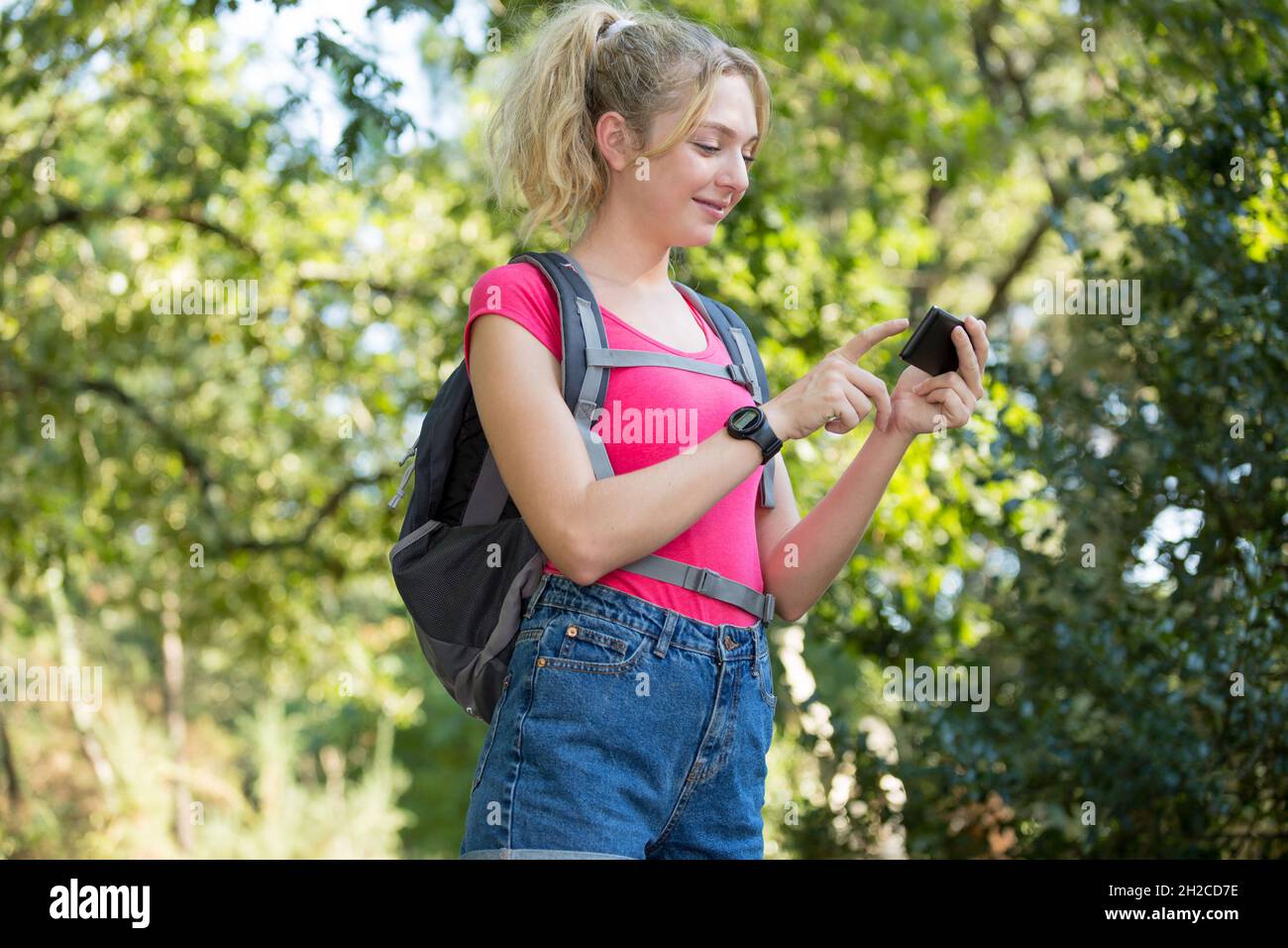 Successful woman hiker using hi-res stock photography and images - Alamy