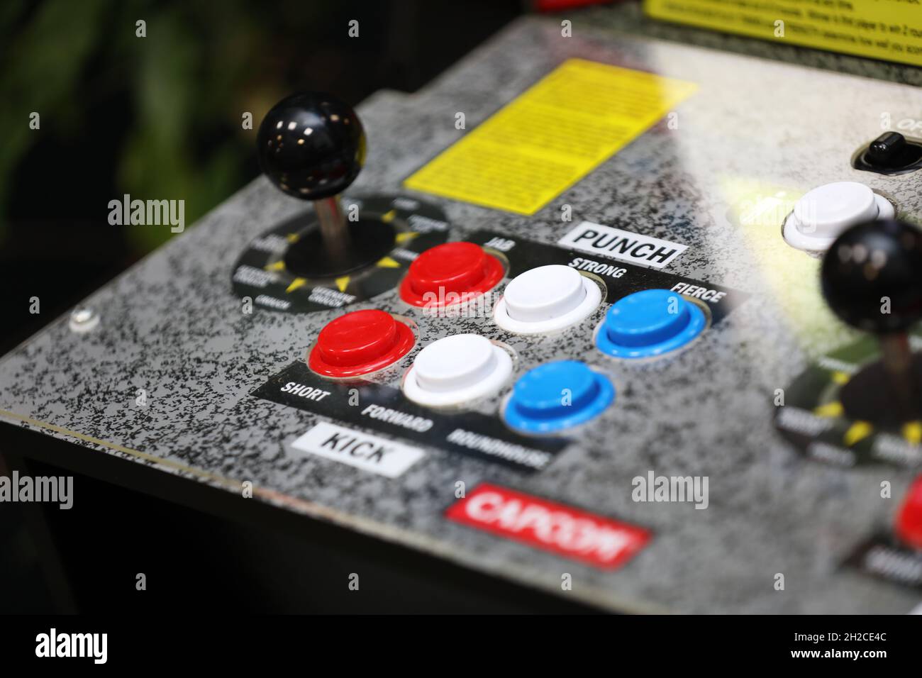 Retro buttons and joystick on a games arcade machine in London