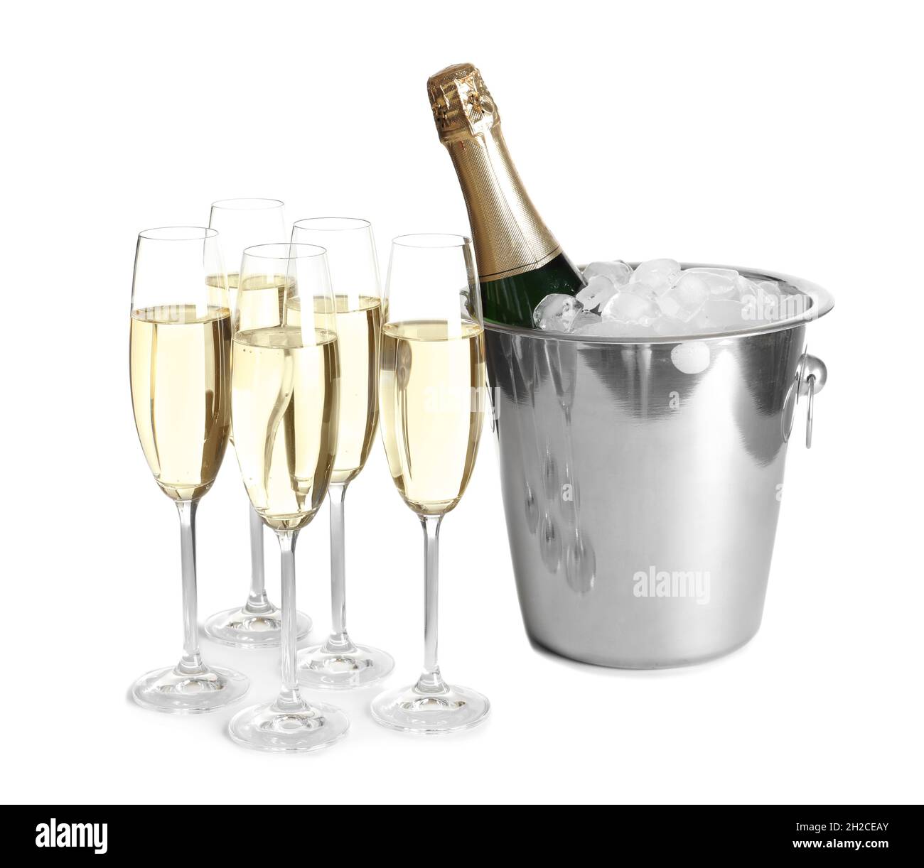 Glasses with champagne and bottle in bucket on white background Stock