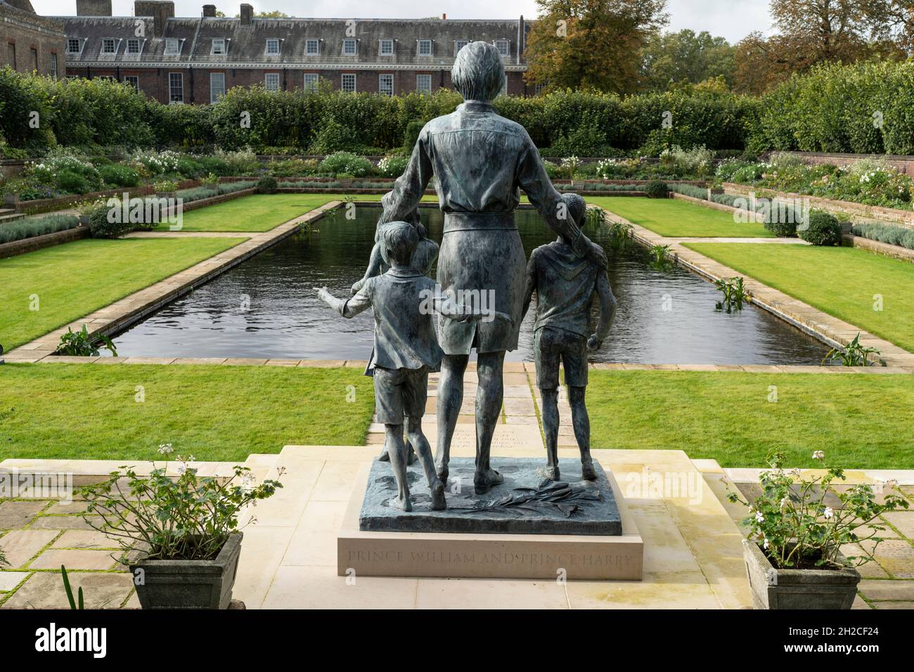 LONDON: The Princess Diana Memorial Garden at Kensington Palace in London. The statue is of Princess Diana with a group of children Photo: David Levenson/Alamy Stock Photo