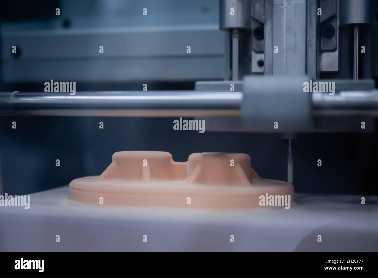 Automated milling machine cutting wooden workpiece from wood pulp Stock