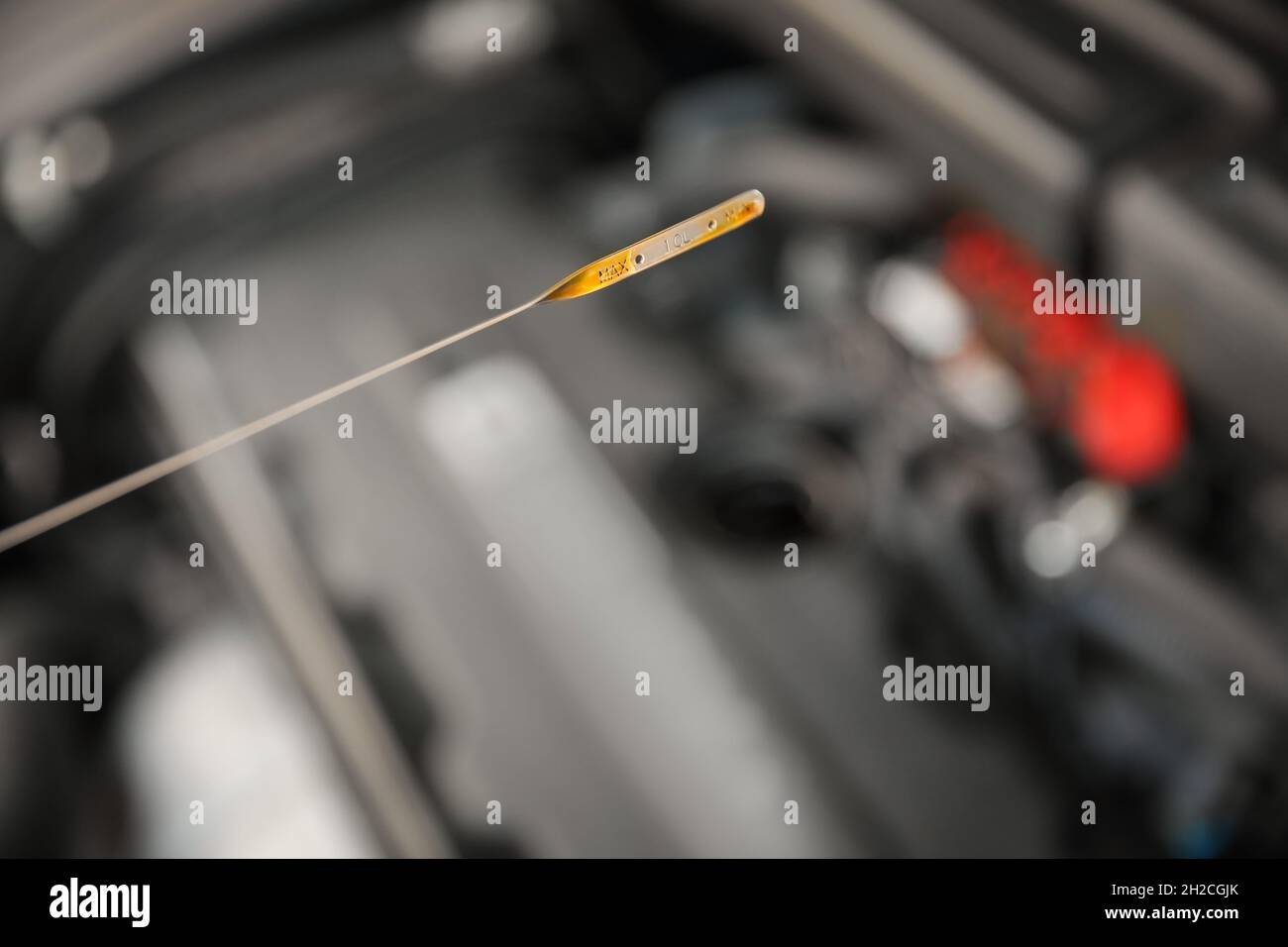 Checking car engine oil level with dipstick, closeup Stock Photo Alamy