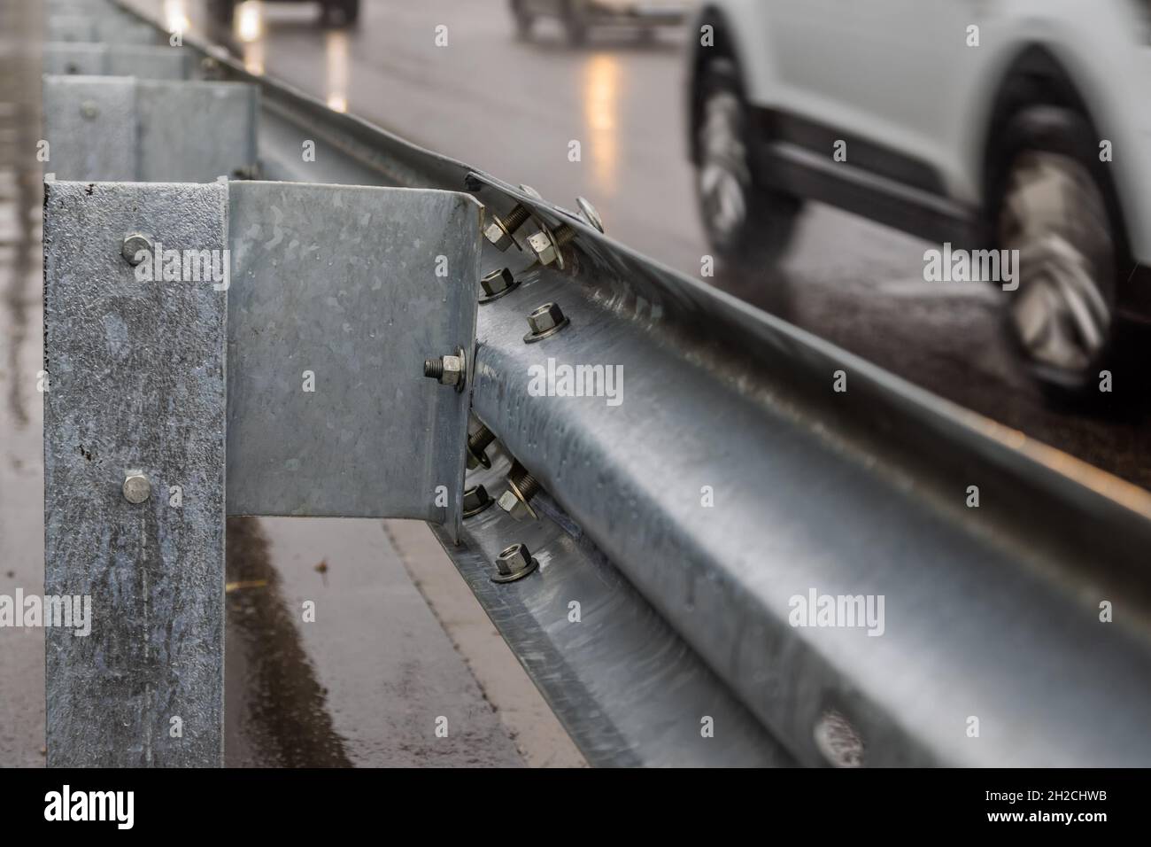 underscrewed nuts and bolts in highway road railing Stock Photo Alamy