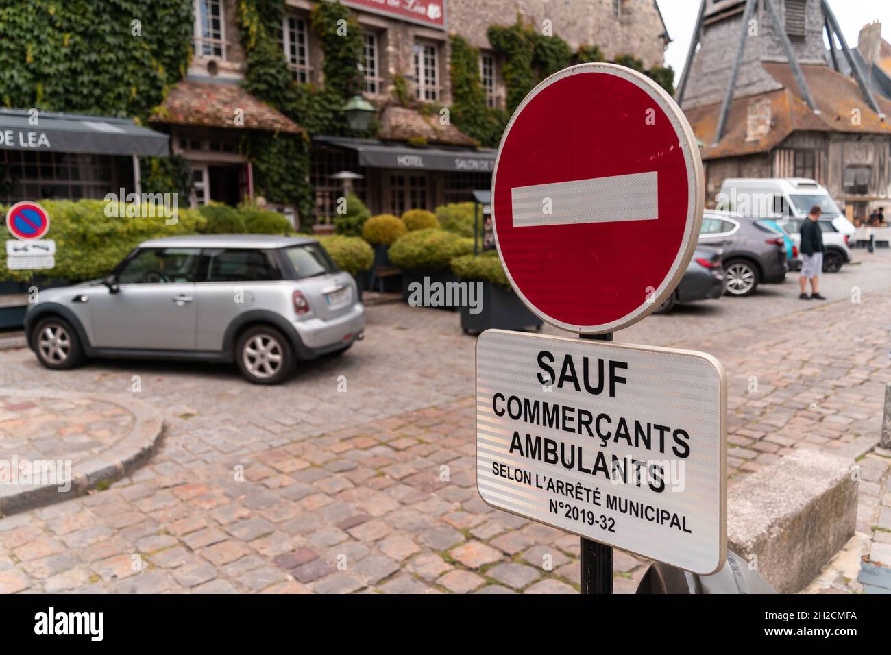 Honfleur, France - August 4, 2021: An inscription in French prohibiting entry to the market for cars other than mobile sellers Stock Photo