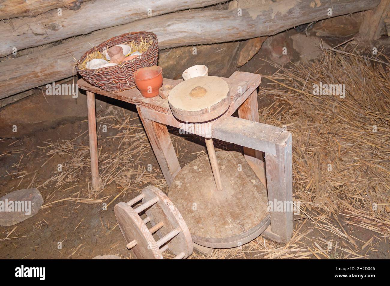 Ancient Celtic potter's wheel inside the house at Celtic open air museum in Nasavrky, Czech republic Stock Photo