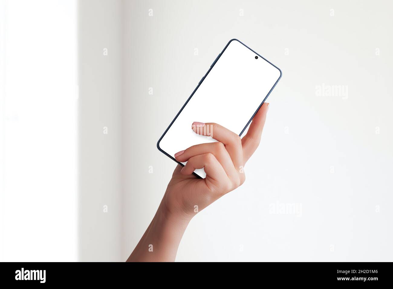 Girl hand shows smart phone mockup Stock Photo