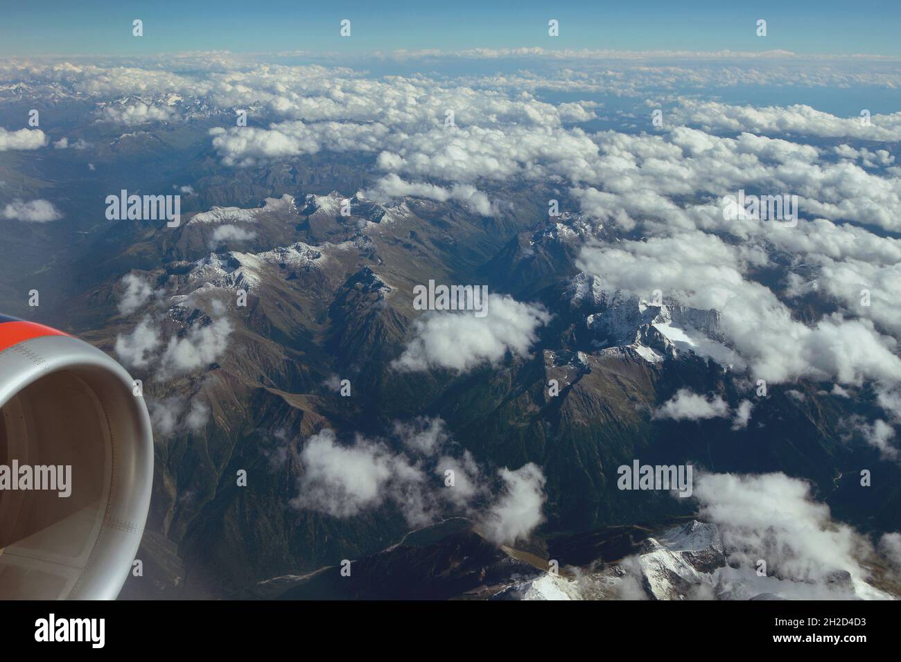 Plane view of mountains and clouds. Caucasus, Krasnodar Territory, Russia Stock Photo