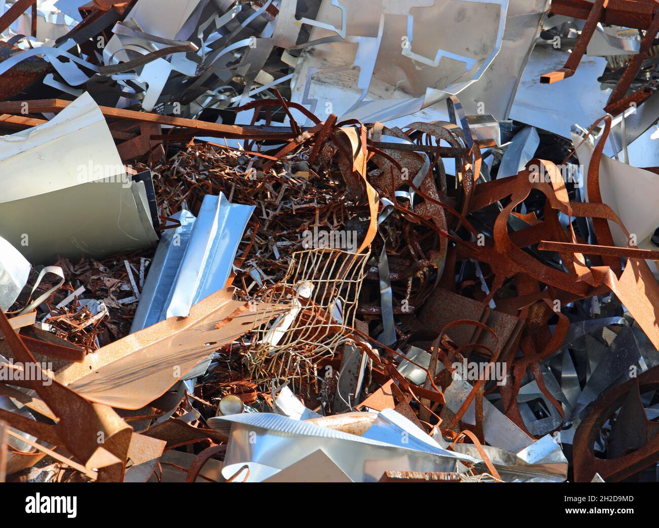 pile of rusty ferrous scrap in a controlled landfill of a foundry Stock Photo