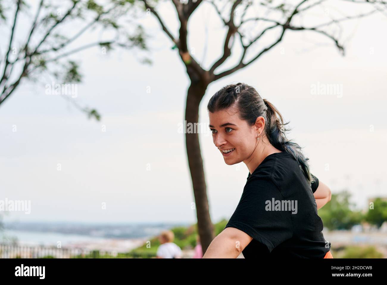 Portrait of a woman training martial arts in a park Stock Photo